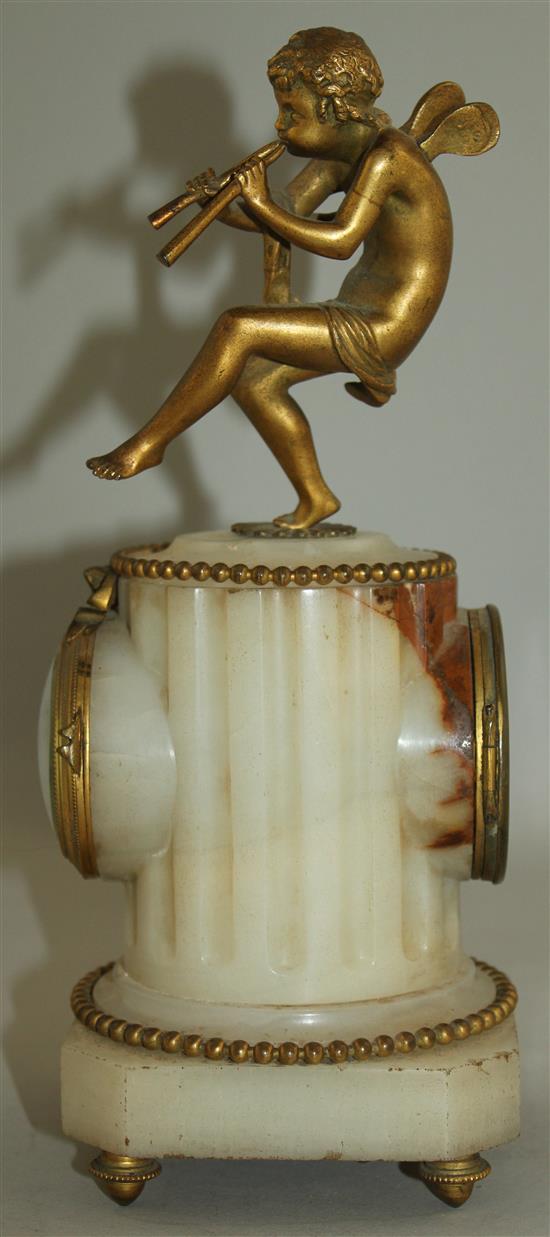 An early 20th century French ormolu mounted alabaster timepiece, 9.5in.